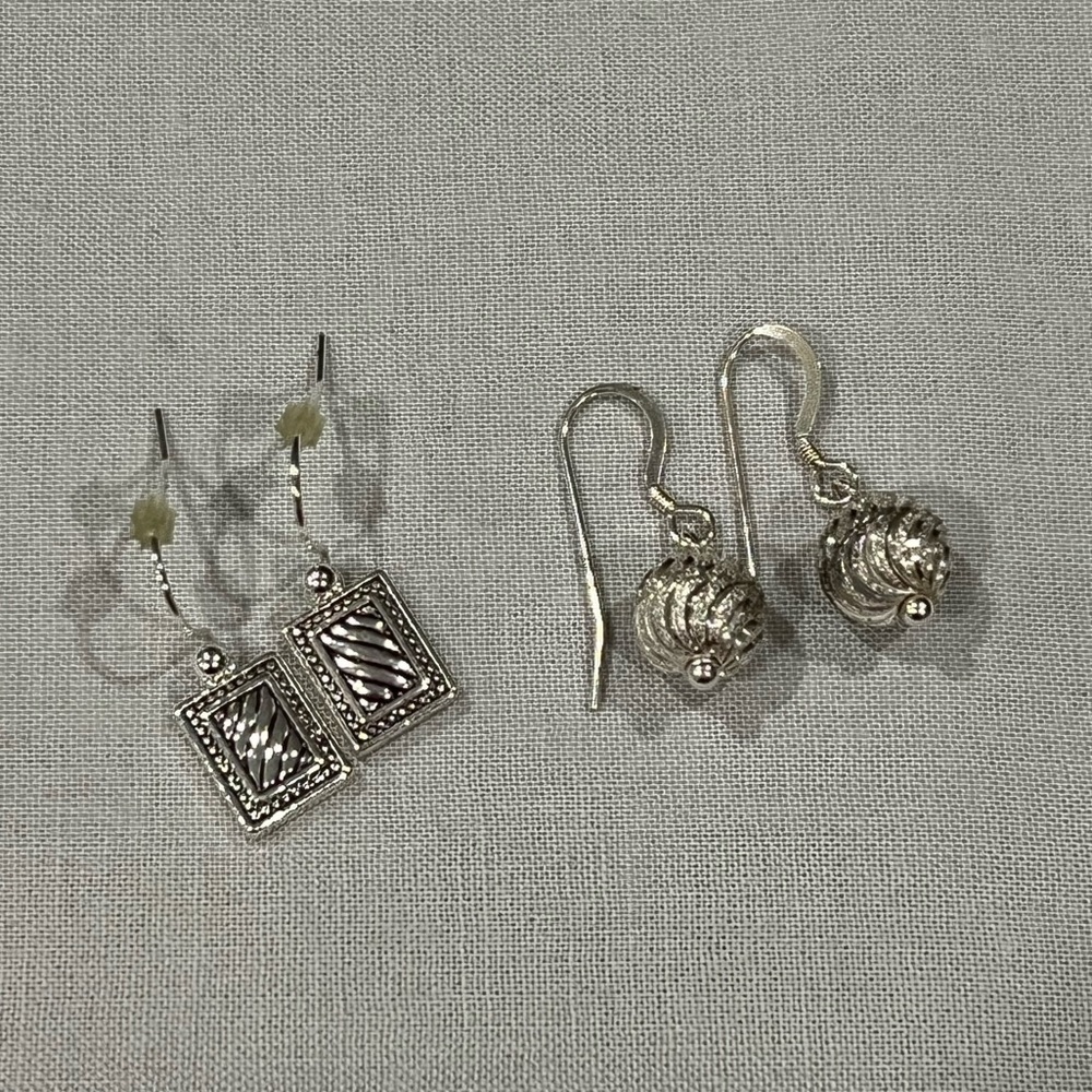 Two pair of silver earrings